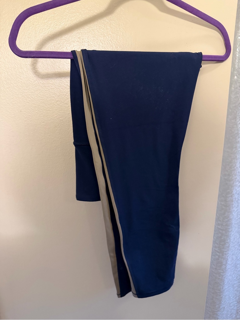 Athleta Elation Yoga Navy Leggings with Tan Side Stripe